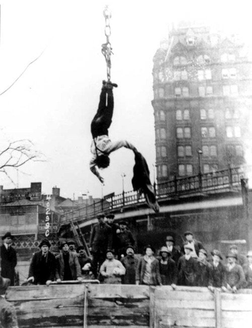 houdini suspended upside down straightjacket escape